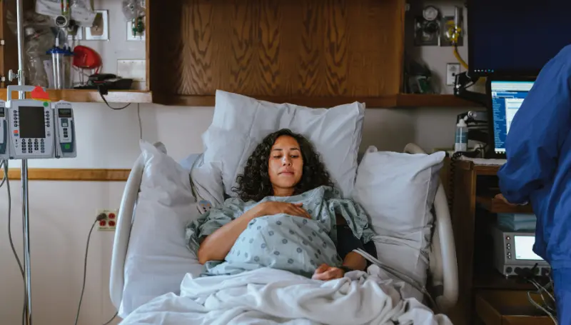 woman in hospital for pregnancy delivery